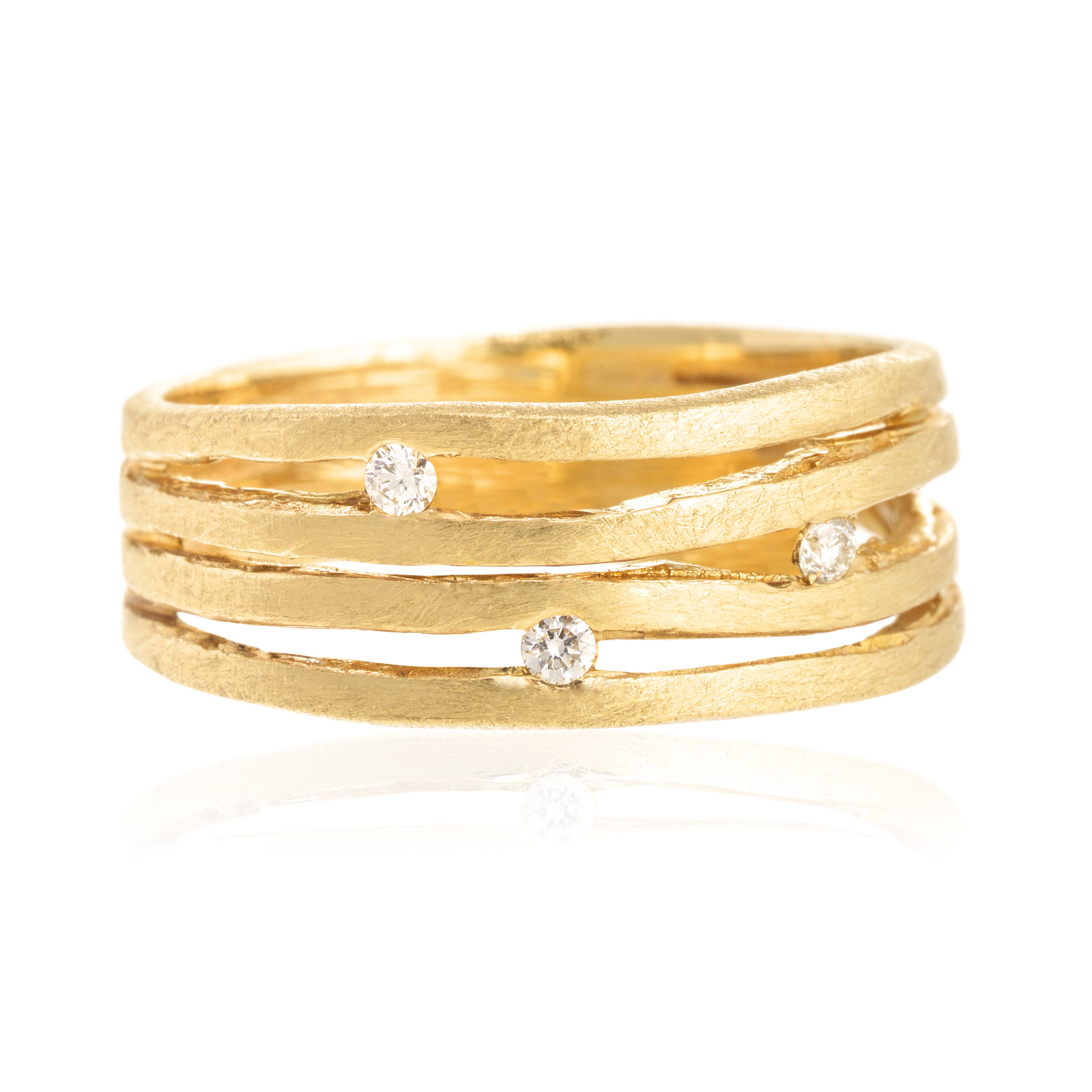 Anillo cinco lineas tres brillantes