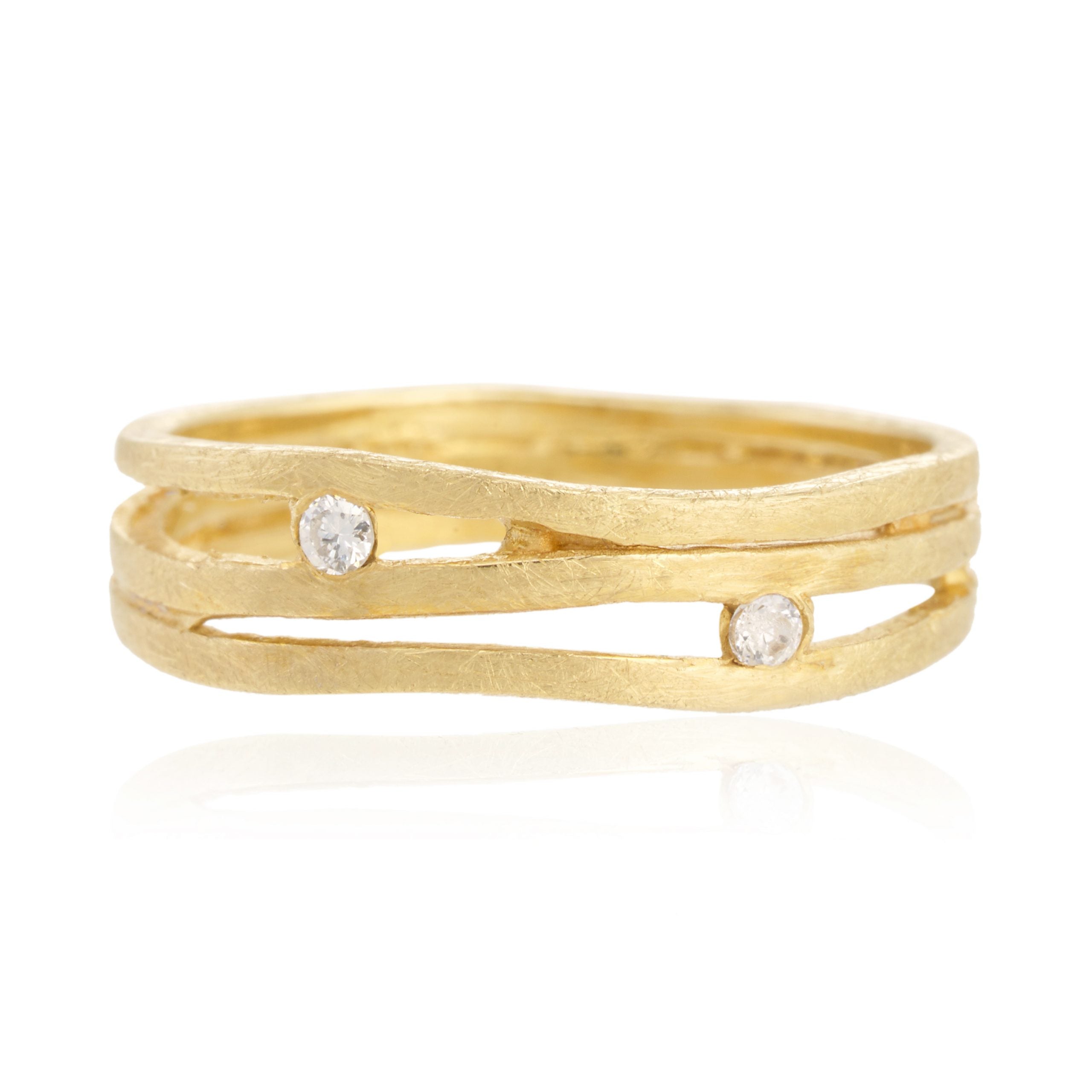 Anillo tres lineas dos brillantes