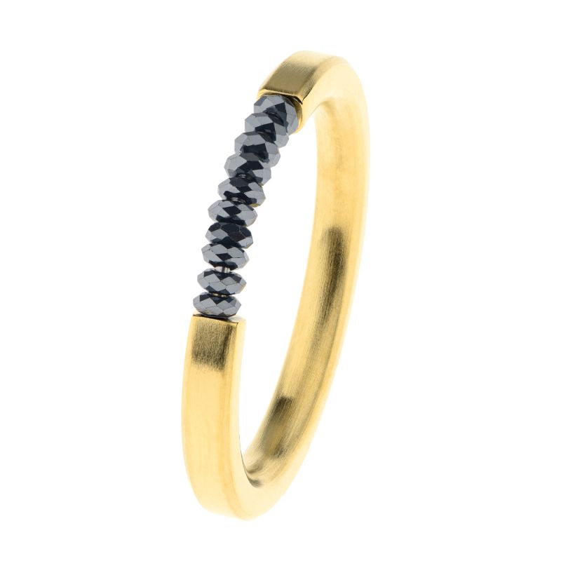 Anillo acero baño oro hematites negros